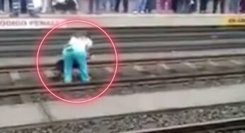 Il cane resta bloccato tra i binari: guardate questa donna come reagisce